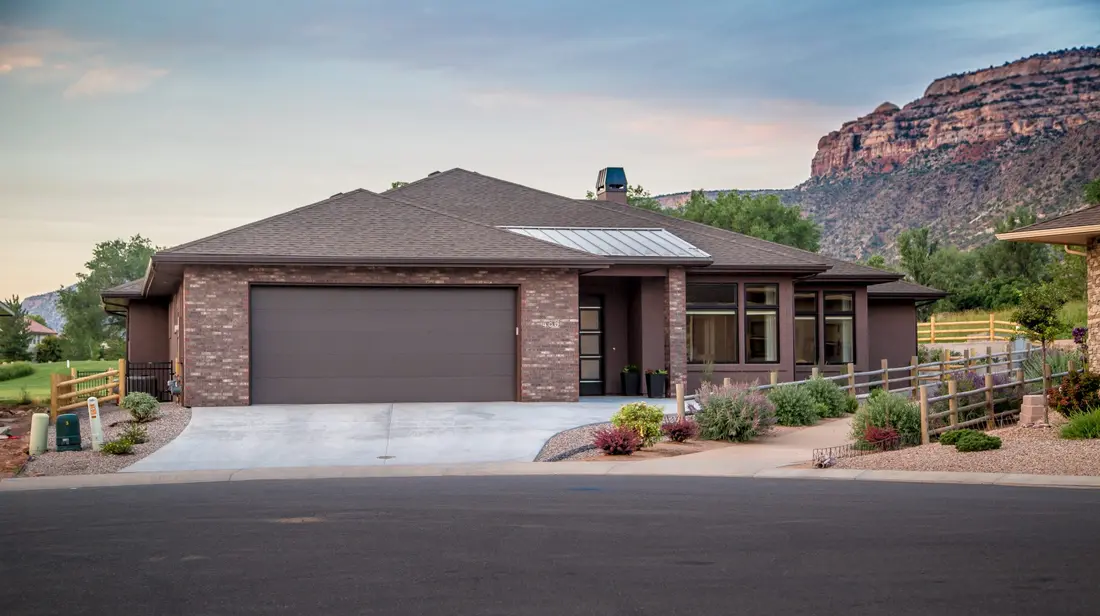 Modern garage door on a Western Colorado home near canyon terrain