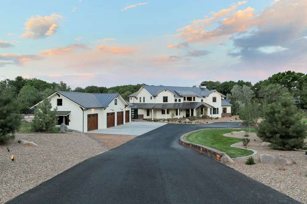 Grand Valley estate driveway with custom garage doors