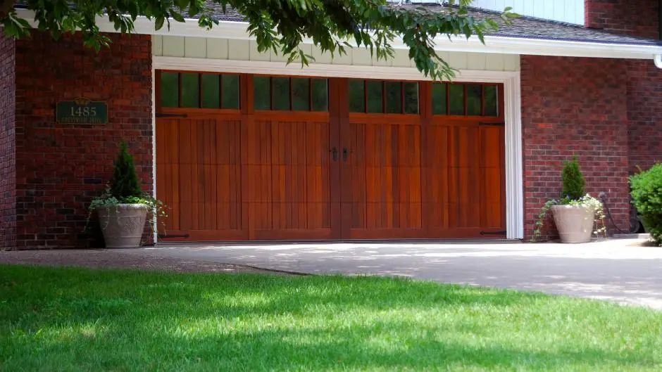 Mahogany-style residential garage door with windows